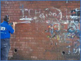 powerwashing brick wall
